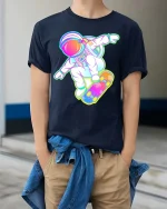 Astronaut Skateboard Neon Space Skater Graphic T-Shirt - model wearing navy tee with hands in pockets