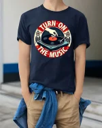 Turn On The Music Vintage Vinyl Record T-Shirt Retro DJ Tee - model wearing navy tee with hands in pockets