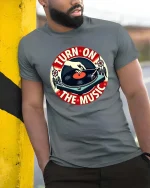 Turn On The Music Vintage Vinyl Record T-Shirt Retro DJ Tee - model wearing grey tee, leaning on column
