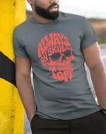 Always On Skull Top Funny Skeleton Graphic T-Shirt Tee - model wearing grey tee, leaning on column