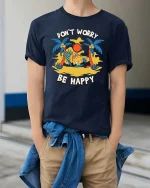Don’t Worry Be Happy Pineapple T-Shirt Funny Summer Tee - model wearing navy tee with hands in pockets