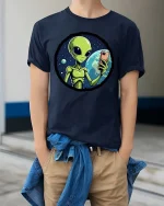 Funny Alien Selfie T-Shirt UFO Space Humor Graphic Tee - model wearing navy tee with hands in pockets