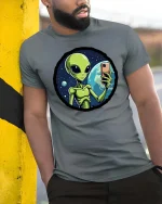 Funny Alien Selfie T-Shirt UFO Space Humor Graphic Tee - model wearing grey tee, leaning on column