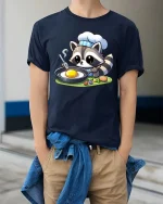 Cute Raccoon Chef Cooking T-Shirt Funny Animal Food Tee - model wearing navy tee with hands in pockets