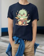 Cute Dinosaur Drummer T-Shirt Funny Music Animal Tee - model wearing navy tee with hands in pockets