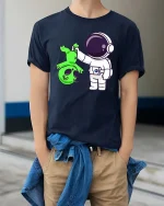 Funny Astronaut Alien T-Shirt Space Humor Graphic Tee - model wearing navy tee with hands in pockets
