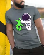 Funny Astronaut Alien T-Shirt Space Humor Graphic Tee - model wearing grey tee, leaning on column
