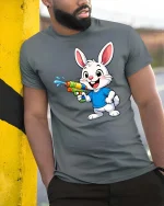 Cute Bunny Water Gun T-Shirt Funny Summer Animal Tee - model wearing grey tee, leaning on column
