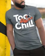 Too Chill Astronaut T-Shirt Funny Space Relax Graphic - model wearing grey tee, leaning on column
