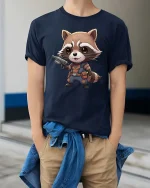 Cute Raccoon Warrior T-Shirt Funny Animal Hero Graphic Tee - model wearing navy tee with hands in pockets