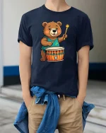 Cute Bear Drummer T-Shirt Funny Animal Music Lover Tee - model wearing navy tee with hands in pockets