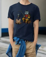 Funny Samurai Cat Roasting Mouse T Shirt Cute Ninja Tee - model wearing navy tee with hands in pockets