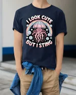 Cute Jellyfish Graphic T-Shirt Funny Ocean Rainbow Tee - model wearing navy tee with hands in pockets