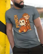 Funny Punch Monkey Cartoon Graphic T-Shirt Cute Humor Tee - model wearing grey tee, leaning on column