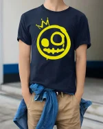 Graffiti Smile Crown Graphic T-Shirt Street Art Style - model wearing navy tee with hands in pockets