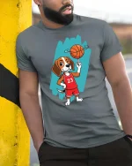 Basketball Dog Graphic T-Shirt Funny Sports Puppy Tee - model wearing grey tee, leaning on column