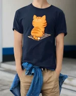 Cute Orange Cat T-Shirt Funny Sitting Kitty Back View Tee - model wearing navy tee with hands in pockets