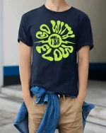 Go With The Flow T-Shirt Retro Psychedelic Graphic Tee - model wearing navy tee with hands in pockets