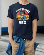 Papasaurus Rex T-Shirt Funny Dino Dad Graphic Retro Tee - model wearing navy tee with hands in pockets