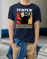Funny Pew Pew Cat T-Shirt Retro Humor Graphic Tee Shirt - model wearing navy tee with hands in pockets