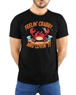 Feelin Crabby T-Shirt Funny Beach Crab Summer Graphic Tee - model wearing black tee with hands behind back