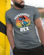 Papasaurus Rex T-Shirt Funny Dino Dad Graphic Retro Tee - model wearing grey tee, leaning on column
