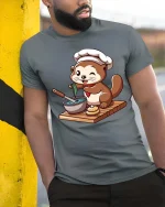 Funny Otter Chef T-Shirt Cute Cooking Animal Graphic Tee - model wearing grey tee, leaning on column