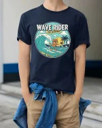 Wave Rider Surf Cat T-Shirt Vintage Beach Graphic Tee - model wearing navy tee with hands in pockets