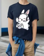 Cute Gamer Bunny T-Shirt Funny Cartoon Gaming Graphic Tee - model wearing navy tee with hands in pockets
