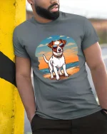 Cool Beach Dog T-Shirt Sunset Puppy Sunglasses Graphic Tee - model wearing grey tee, leaning on column