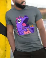 Funny Purple Dino Monster T-Shirt Cute Cartoon Graphic Tee - model wearing grey tee, leaning on column