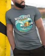 Wave Rider Surf Cat T-Shirt Vintage Beach Graphic Tee - model wearing grey tee, leaning on column