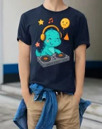 Cute DJ Dinosaur T-Shirt Funny Music Cartoon Party Tee - model wearing navy tee with hands in pockets