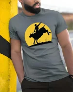 Rodeo Bull Riding Silhouette T-Shirt Western Cowboy Tee - model wearing grey tee, leaning on column