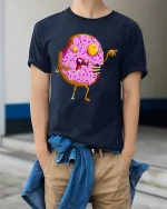Zombie Donut Graphic T-Shirt Funny Horror Food Creepy Art - model wearing navy tee with hands in pockets