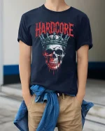 Hardcore Skull Crown Graphic T-Shirt Dark Gothic Style Tee - model wearing navy tee with hands in pockets