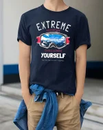 Extreme Adventure Graphic T-Shirt Challenge Yourself Tee - model wearing navy tee with hands in pockets