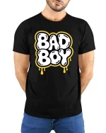 Bad Boy Graphic T-Shirt Bold Streetwear Drip Style Tee - model wearing black tee with hands behind back