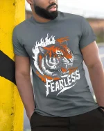 Fearless Tiger Graphic T-Shirt Bold Wild Animal Power Tee - model wearing grey tee, leaning on column