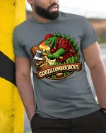 Godzillumberjack Graphic T-Shirt Funny Lumberjack Monster - model wearing grey tee, leaning on column