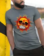 Flaming Skull Sun Graphic T-Shirt Dark Gothic Fire Art Tee - model wearing grey tee, leaning on column