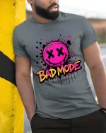 Bad Mode Smiley T-Shirt Neon Streetwear Graphic Tee - model wearing grey tee, leaning on column