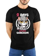 Funny Sarcastic Cat T-Shirt Zero Days Without Sarcasm - model wearing black tee with hands behind back