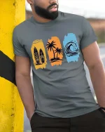 Surf Beach T-Shirt Palm Wave Vintage Summer Graphic Tee - model wearing grey tee, leaning on column
