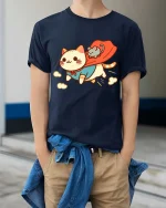 Cute Superhero Cat Cartoon Funny Animal Graphic T-shirt - model wearing navy tee with hands in pockets