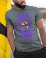 Love Is A State Of Mind Retro Psychedelic Skull Graphic T-shirt - model wearing grey tee, leaning on column