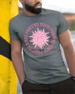 Positive Vibes Retro Sun Aesthetic Inspirational Graphic T-Shirt - model wearing grey tee, leaning on column