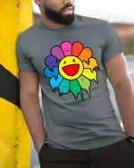Happy Rainbow Flower Smiley Cute Graphic T-Shirt Style - model wearing grey tee, leaning on column
