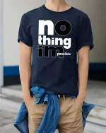 No Thing Impossible Motivational Typography Success Mindset Tshirt - model wearing navy tee with hands in pockets