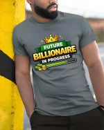 Future Billionaire In Progress Motivational Success Tshirt - model wearing grey tee, leaning on column
